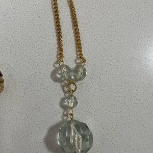 Gold chain with light green beaded necklace